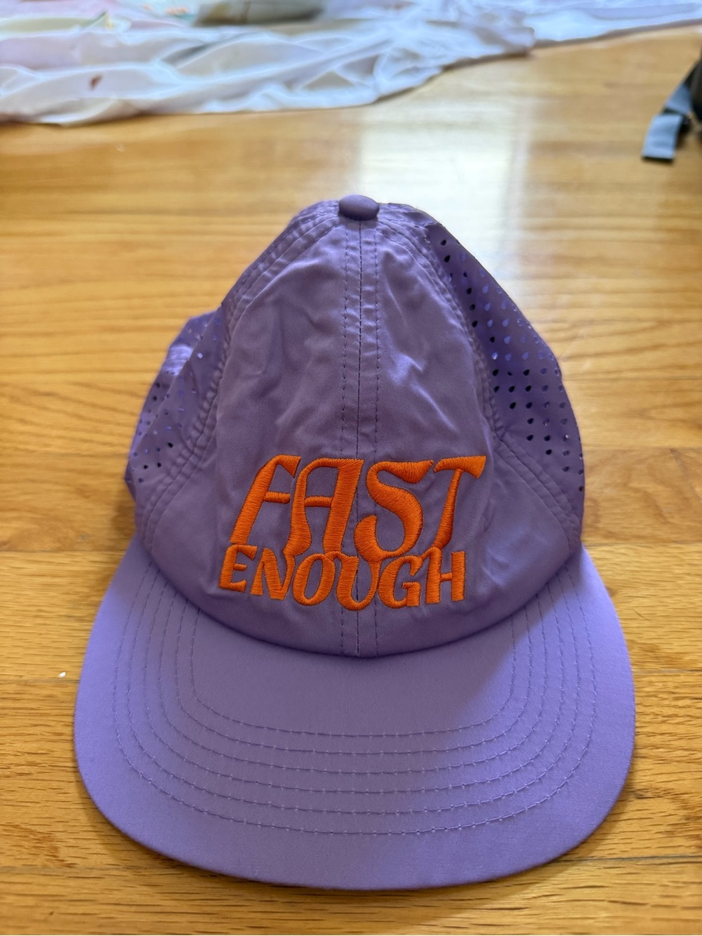 Lavender 'FAST ENOUGH' Embroidered Performance Cap from RNNR
